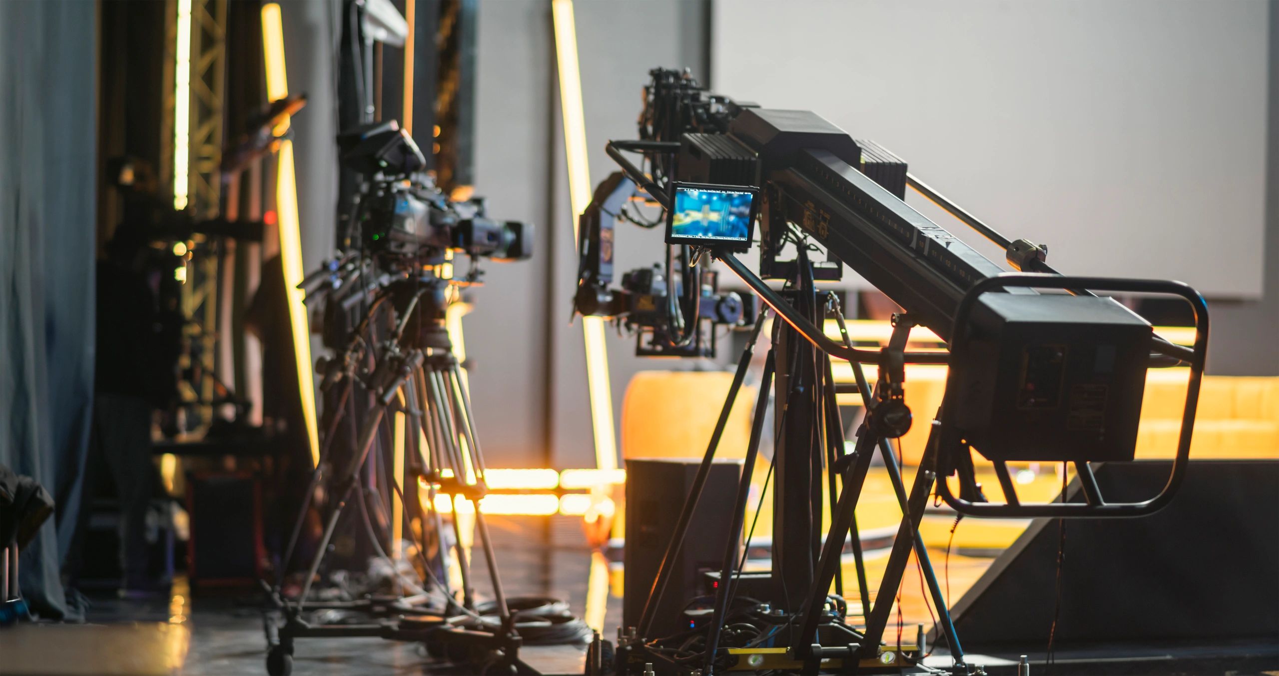 Professional studio with camera crane and production lighting